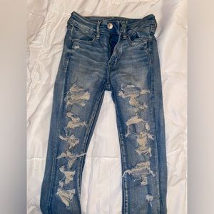 Destroyed ripped light jeans
